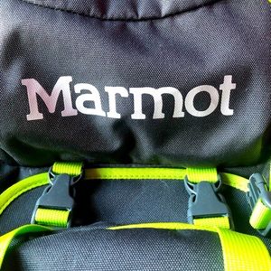 A large Marmot gray with lime green trim backpack.